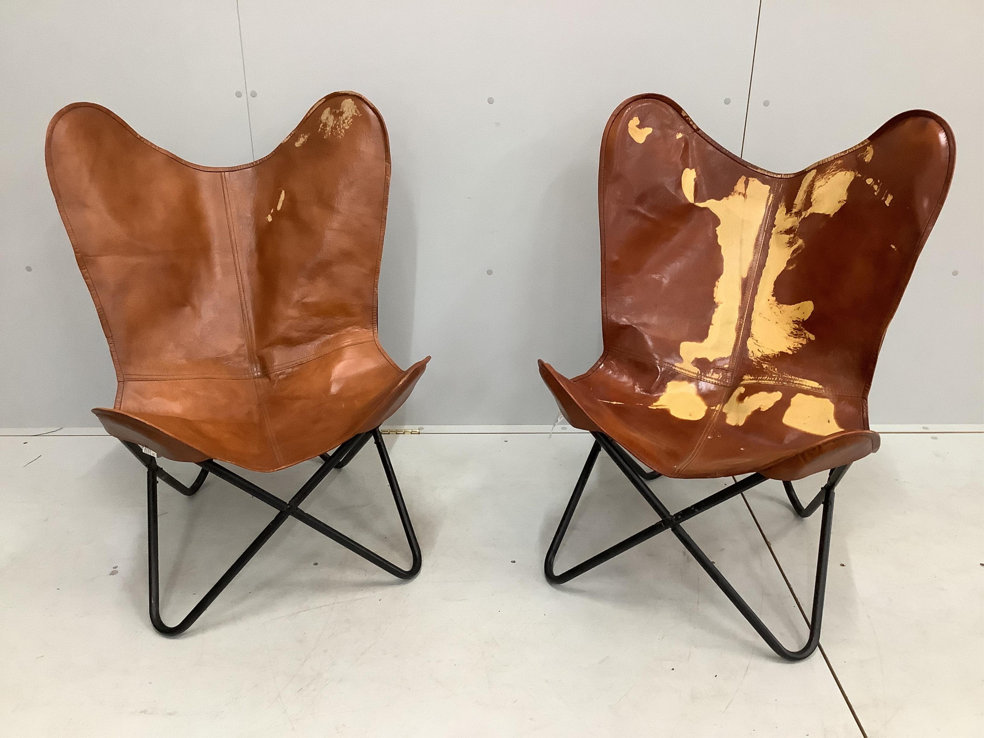 A pair of Vida faux hide butterfly chairs width 60cm, depth 60cm, height 95cm